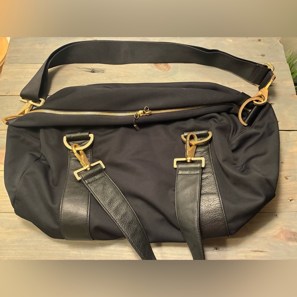 Black Men's Bag with Gold Accents